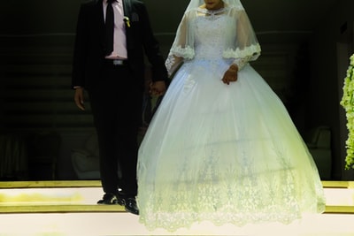 woman in white floral wedding dress